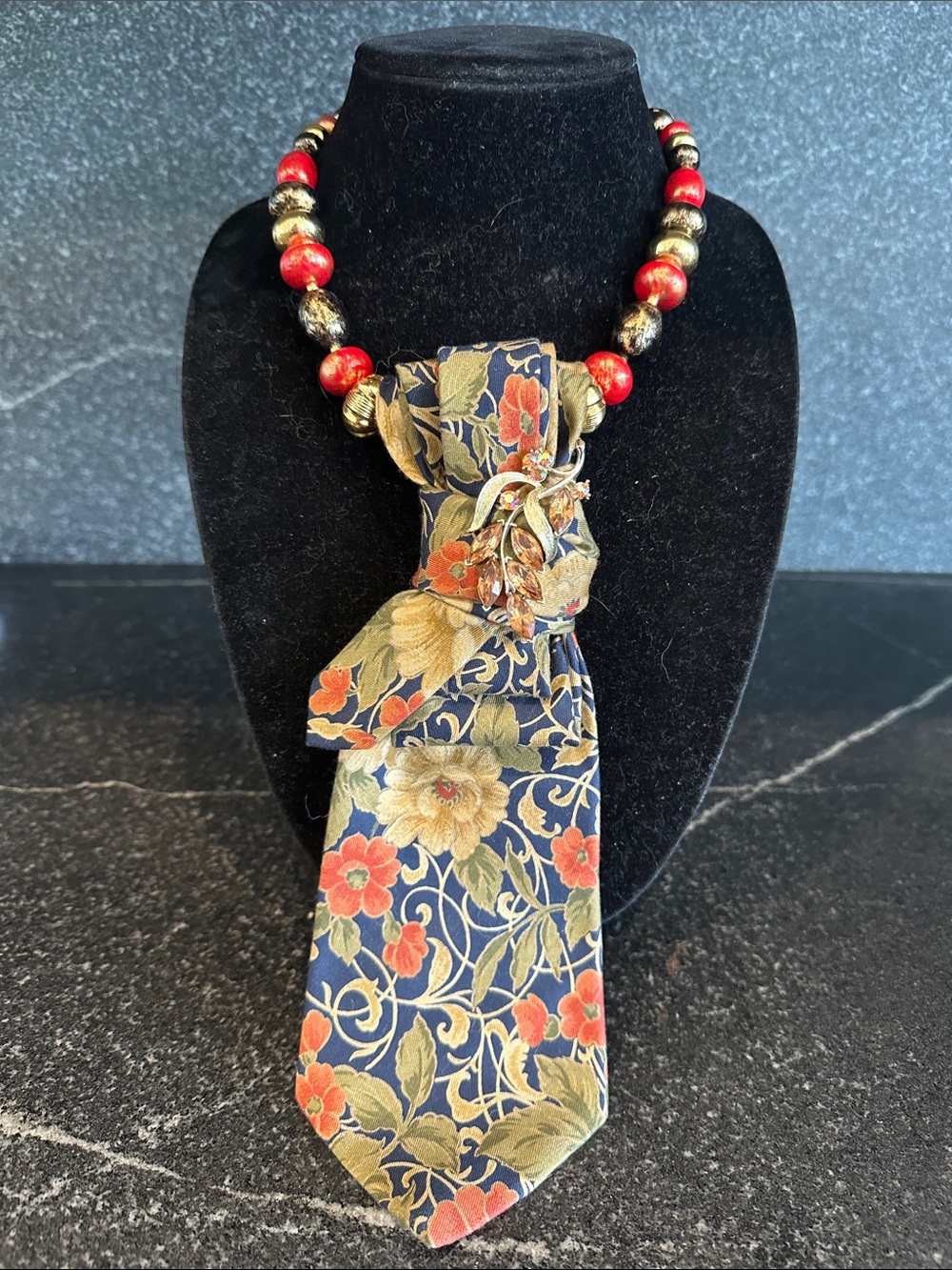 Cotton tie necklace vintage brooch, and multicolored beaded necklace
